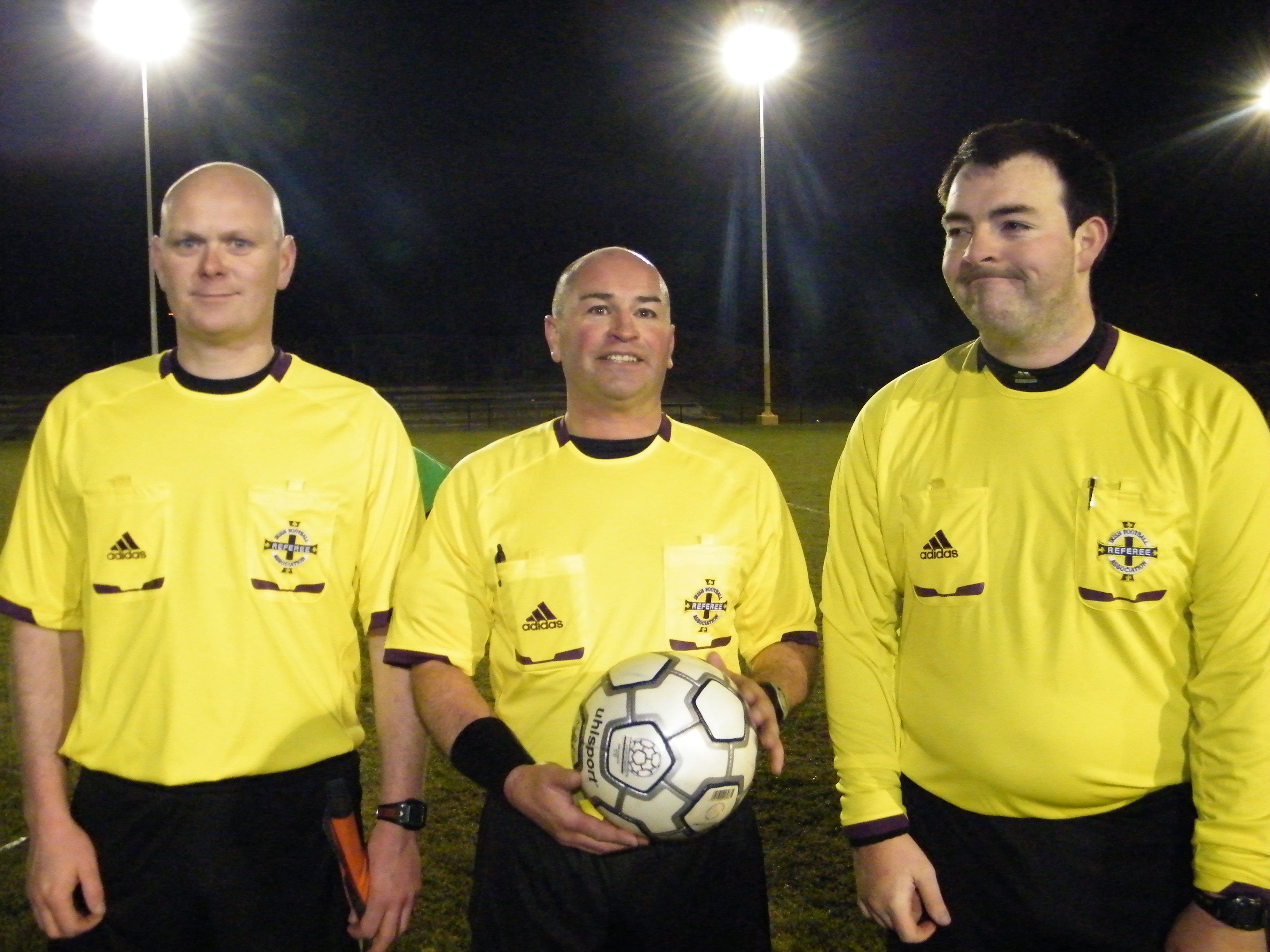 Referee Ian Banks with his Assistants 